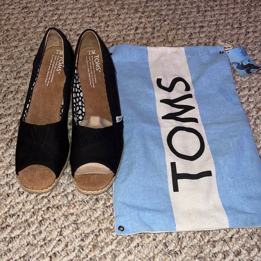 Size 7 Toms wedges. Worn once.